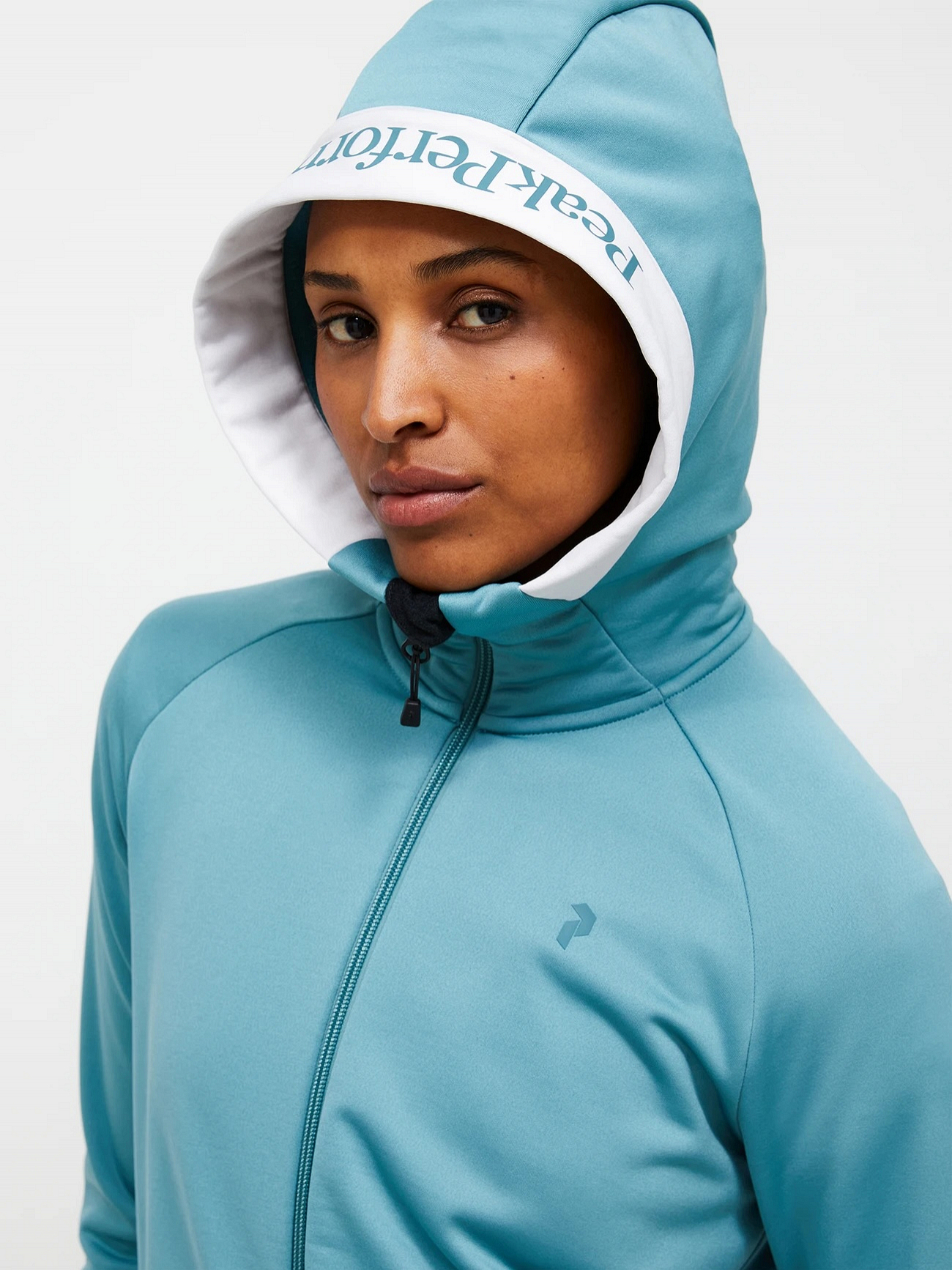W Rider Essentials Zip Hood (FW25) - Peak Performance Whistler